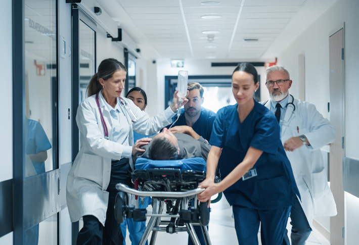 Medical team rushing patient on stretcher